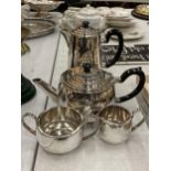 A SILVER PLATED FOUR PIECE TEASET TO INCLUDE A TEAPOT, HOT WATER JUG, CREAM JUG AND SUGAR BOWL