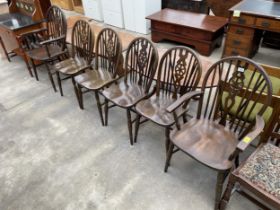 A SET OF SIX JAYCEE WHEELBACK WINDSOR STYLE CHAIRS, TWO BEING CARVERS