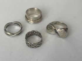 FOUR ASSORTED SILVER RINGS