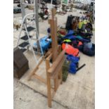 A LARGE WOODEN ARTISTS EASEL