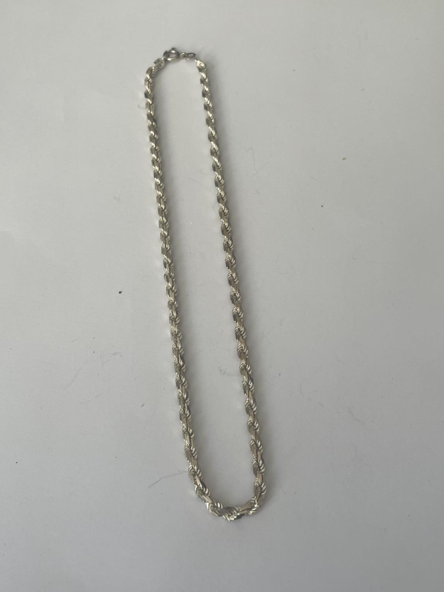 A SILVER ROPE CHOKER NECKLACE