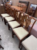 A SET OF FOUR MAHOGANY CHIPPENDALE STYLE DINING CHAIRS WITH PIERCED SPLAT BACKS