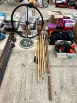 AN ASSORTMENT OF ITEMS TO INCLUDE A PARASOL BASE, LARGE LATHE FLY WHEEL, GARDEN SHEARS AND A HOE ETC