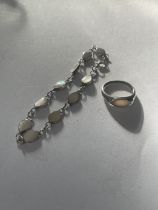 A SILVER BRACELET AND SILVER RING