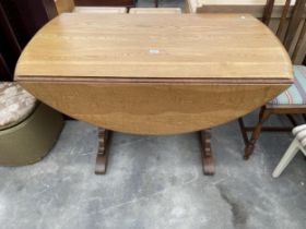 AN ERCOL ELM DROP-LEAF DINING TABLE, 50 X 46" OPEN