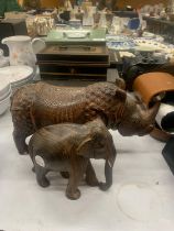 TWO VINTAGE WOODEN ANIMAL FIGURES TO INCLUDE A CARVED RHINOCEROS