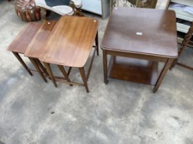 A NEST OF THREE REMPLOY TABLES AND A TV TABLE