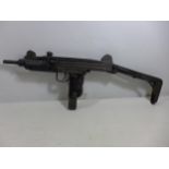 A DEACTIVATED UZI 9MM SUB MACHINE GUN, WITH FOLDING STOCK, 26CM BARREL, LENGTH 65CM, SERIAL NUMBER