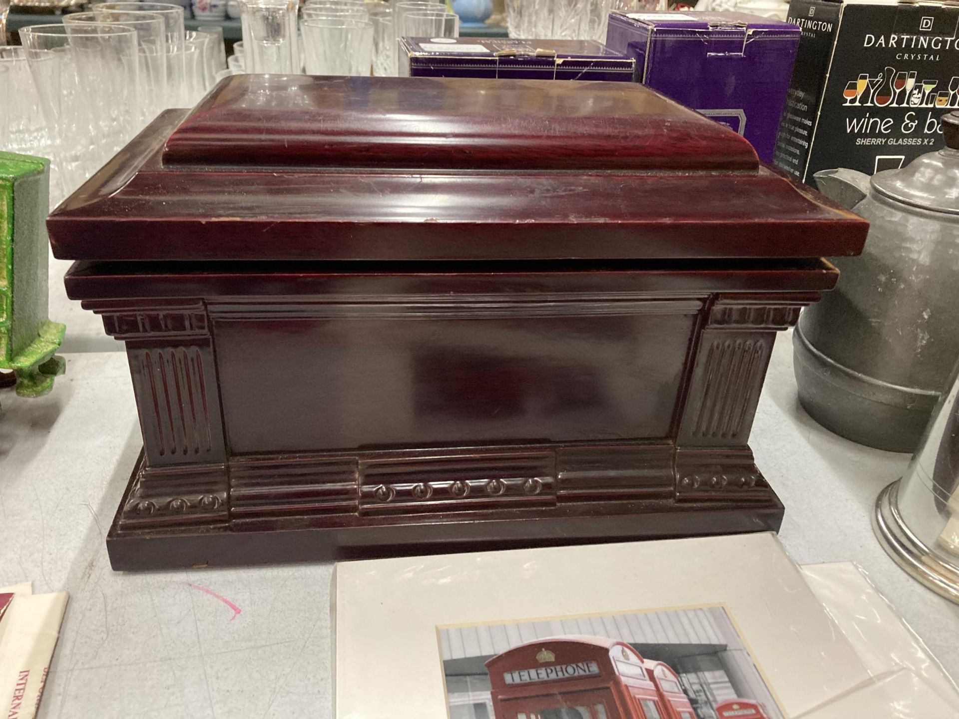 AN UNDERTAKERS WOODEN CASKET