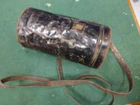 A WORLD WAR II GAS MASK AND TIN