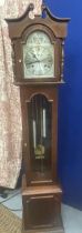 A VINTAGE WOODEN CASED TEMPUS FUGIT GRANDFATHER CLOCK