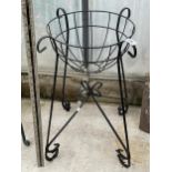 A SMALL METAL PLANT STAND