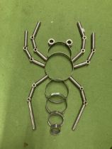 A METAL LOBSTER MADE FROM NUTS AND BOLTS, ETC