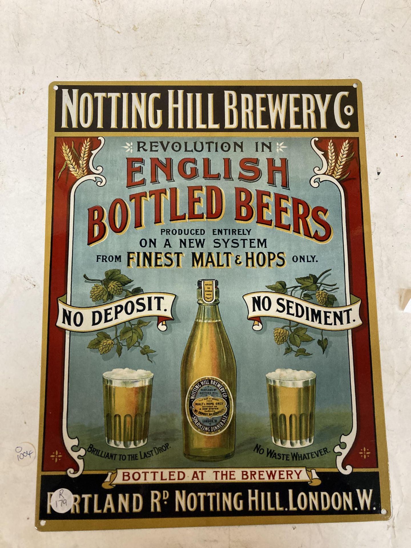 A METAL NOTTING HILL BREWERY SIGN, 30CM X 40CM