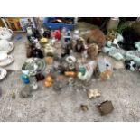 A LARGE ASSORTMENT OF CERAMIC AND WOODEN CAT FIGURES TO ALSO INCLUDE TWO NOVELTY TEAPOT