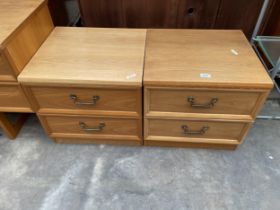 A PAIR OF G-PLAN BEDSIDE CHESTS WITH TWO DRAWERS