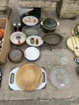 AN ASSORTMENT OF COOKING POTS , GLASS WARE AND CHOPPING BOARDS ETC