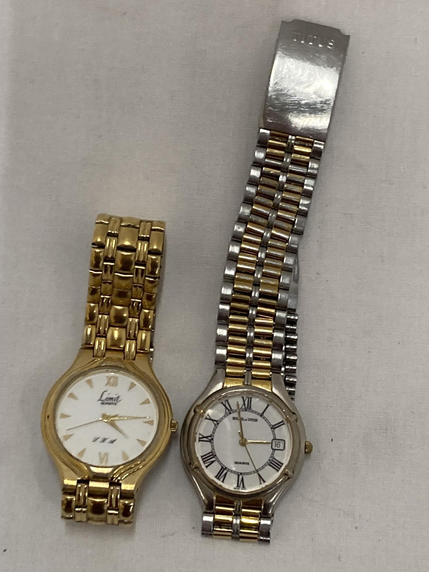 TWO WRISTWATCHES TO INCLUDE A LIMIT INTERNATIONAL AND A SOVIL TITUS