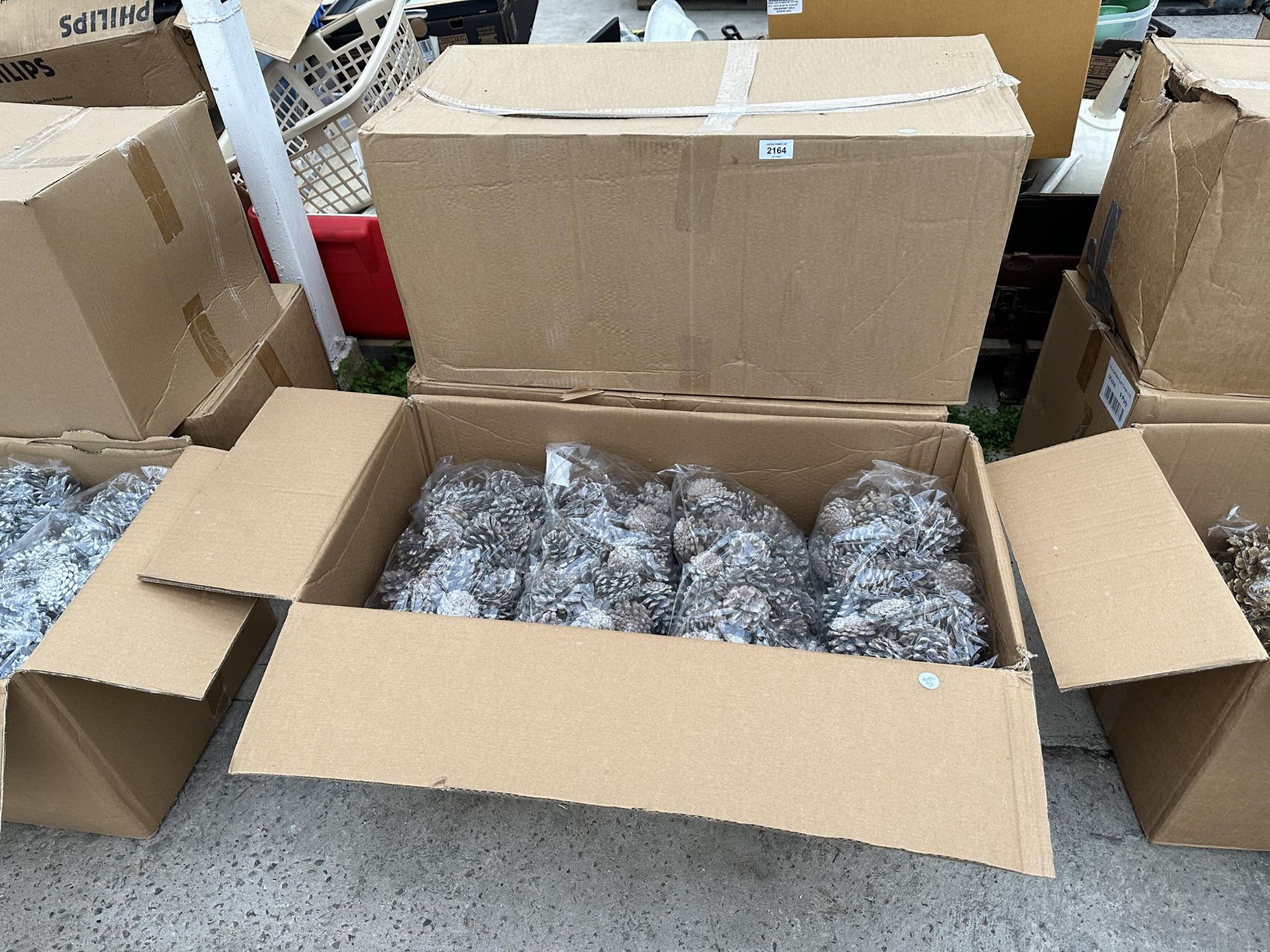 A LARGE QUANTITY OF NEW AND BOXED WHITE TIPPED PINE CONES *PLEASE NOTE VAT TO BE ADDED TO THIS LOT*