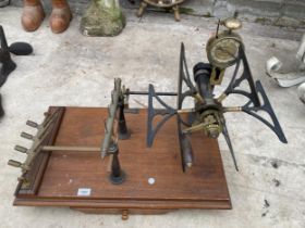 A VINTAGE INDUSTRIAL SCRATCH BUILT YARN SPINNING MACHINE BEARING THE NAME GOODBRAND & CO LTD