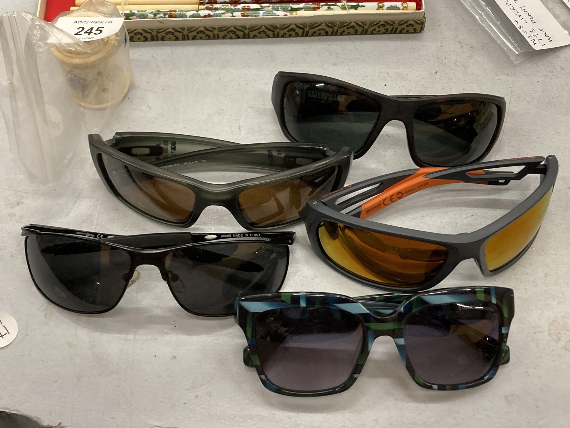 A GROUP OF SUNGLASSES