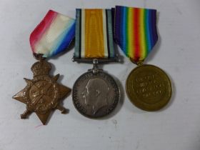 A WORLD WAR I MEDAL GROUP AWARDED TO TS - 3303 CORPORAL T H WILSON OF THE ARMY SERVICE CORPS