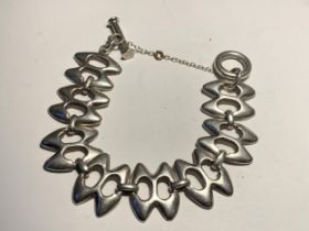 A HEAVY SILVER BRACELET