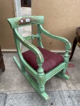 A VICTORIAN STYLE PAINTED CHILDS ROCKING CHAIR