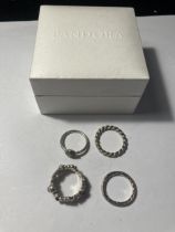 FOUR PANDORA SILVER RINGS MARKED 925 WITH ONE PRESENTATION BOX