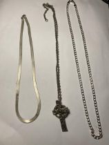 THREE SILVER NECKLACES ONE WITH A CROSS PENDANT