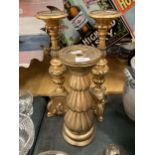 THREE LARGE HEAVY ORNATE GOLD COLOURED CANDLESTICKS, HEIGHT 47CM AND 38CM