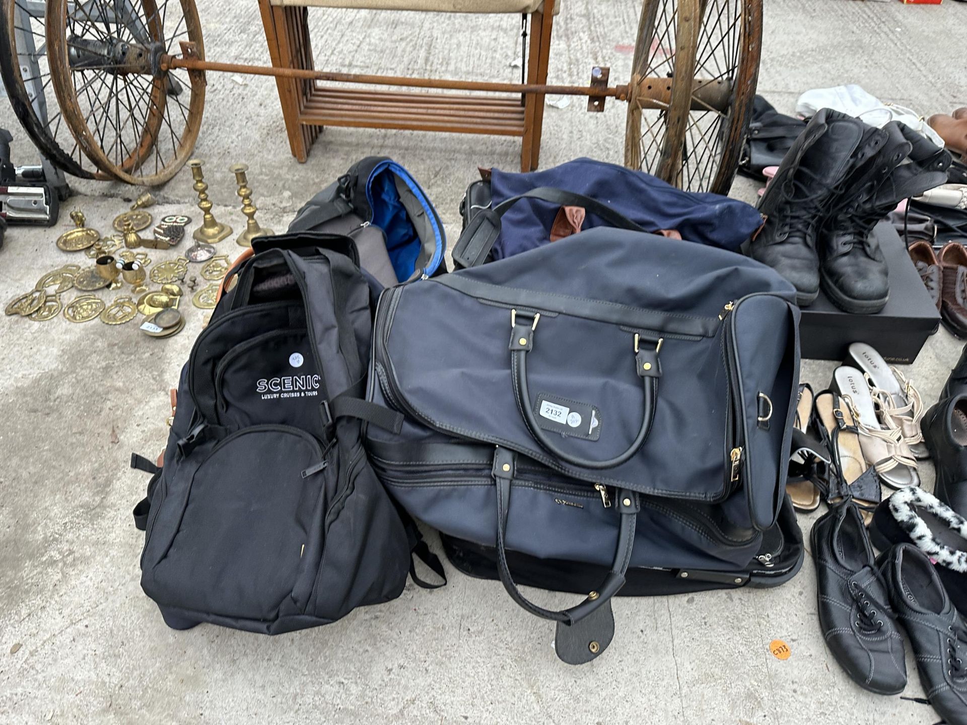 AN ASSORTMENT OF HOLDALLS