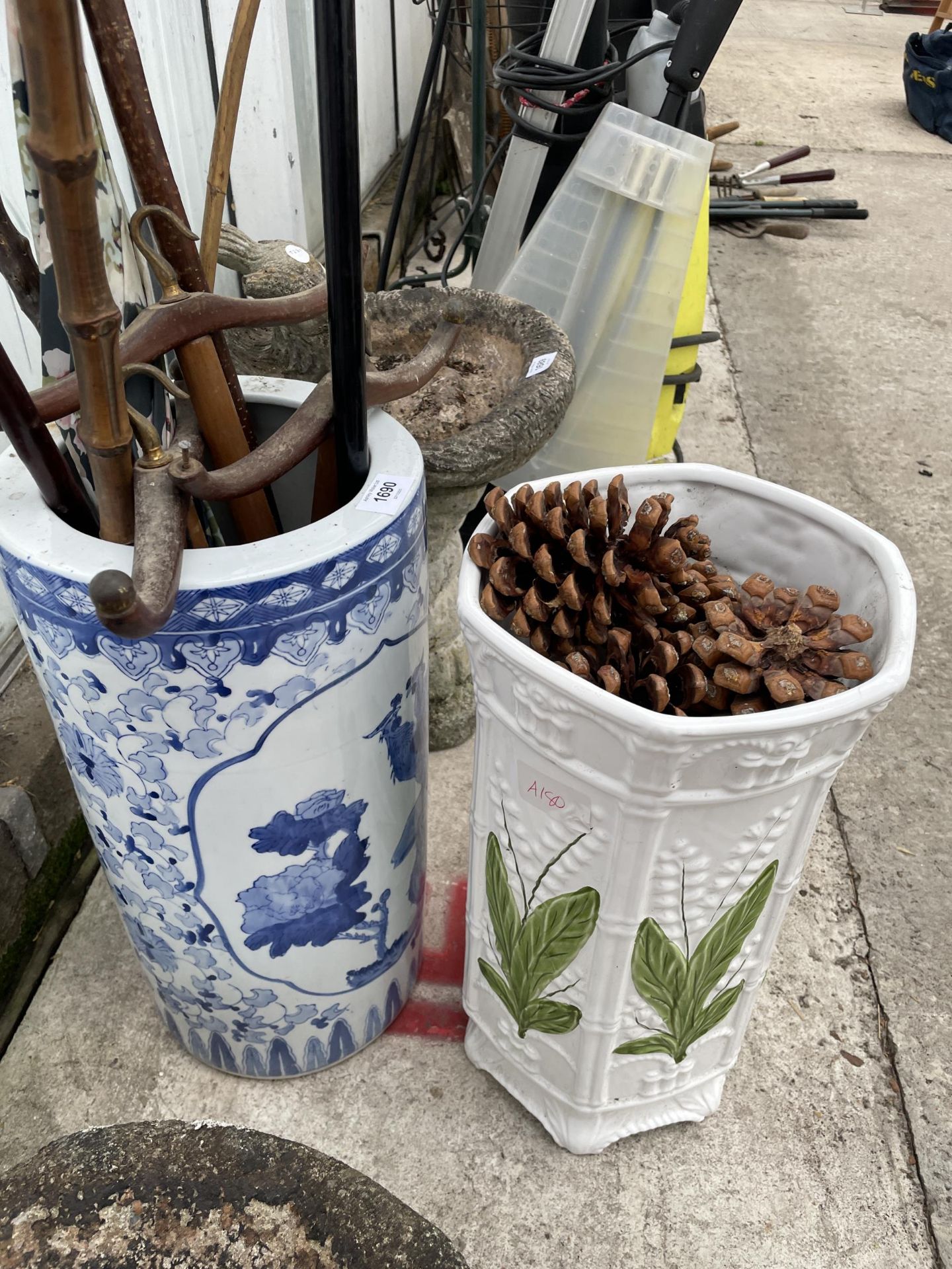 TWO CERAMIC STICK STANDS AND AN ASSORTMENT OF WALKING STICKS - Image 2 of 2