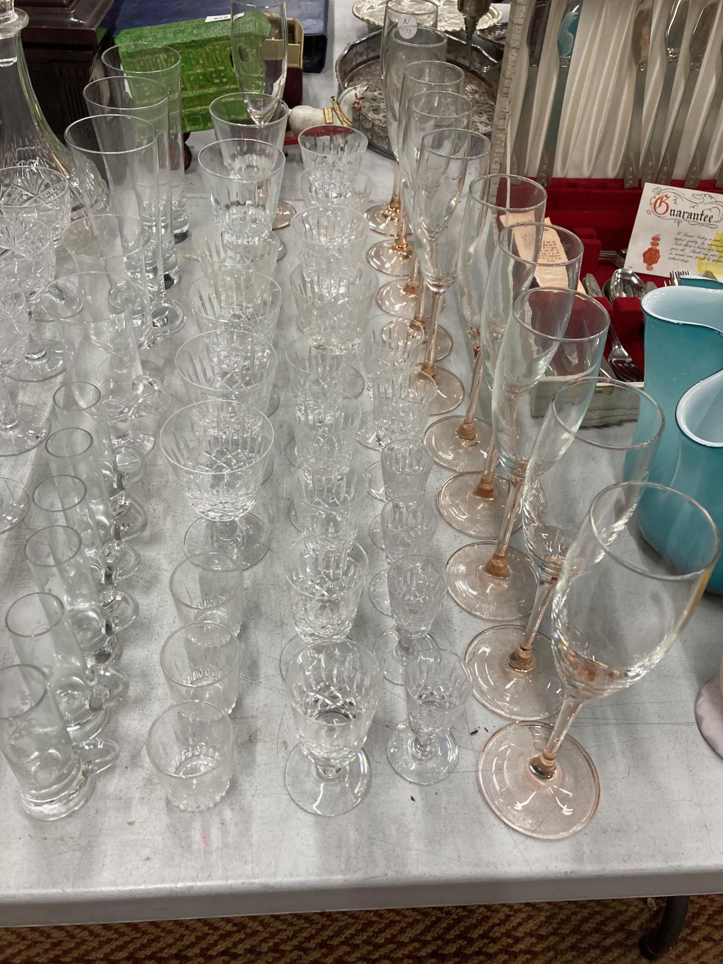 A VERY LARGE QUANTITY OF GLASSES, SOME CUT GLASS, TO INCLUDE CHAMPAGNE FLUTES, WINE, SHERRY, PORT, - Image 2 of 5