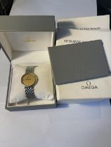 AN OMEGA DE VILLE WRIST WATCH WITH PRESENTATION BOX, OPERATING INSTRUCTIONS AND FURTHER PAPERWORK.