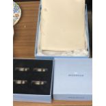 A BOXED WEDGWOOD APOLLO NAPKIN RING SET AND BOXED NOTEBOOK