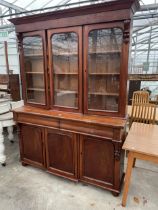 A VICTORIAN MAHOGANY THREE DOOR BOOKCASE ON BASE ENCLOSING THREE CUPBOARDS AND TWO DRAWERS, 66.5"