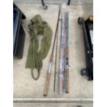 AN ASSORTMENT OF VINTAGE FISHING RODS