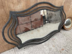 A LARGE CAST METAL FRAMED WALL MIRROR, 69 X 42"