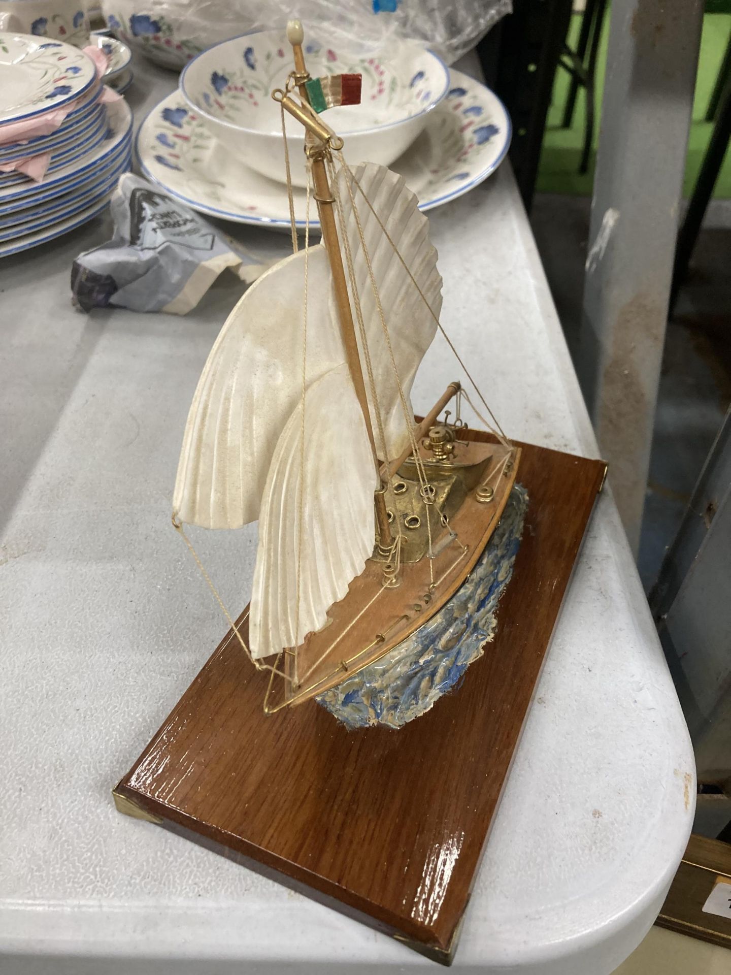 A MODEL OF A VINTAGE ITALIAN YACHT, ON A WOODEN PLINTH, WITH ENAMEL AND BRASS HULL, HEIGHT APPROX - Image 3 of 3