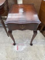 A MODERN MAHOGANY LAMP TABLE WITH SINGLE DRAWER