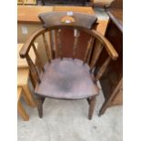 AN ELM AND BEECH SMOKERS BOW CHAIR WITH TURNED UPRIGHTS
