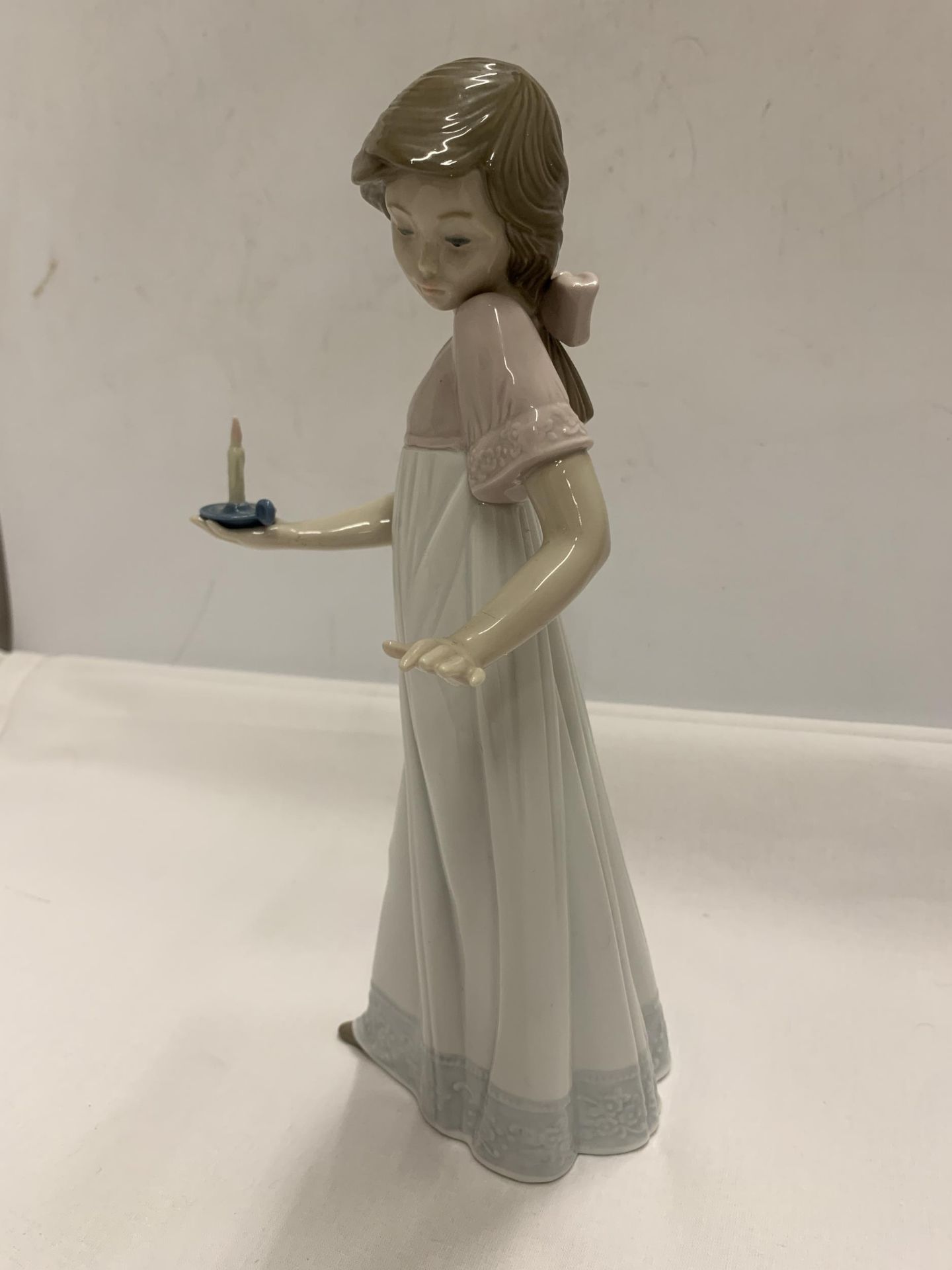 A NAO FIGURE OF A GIRL HOLDING A CANDLE - Image 2 of 5