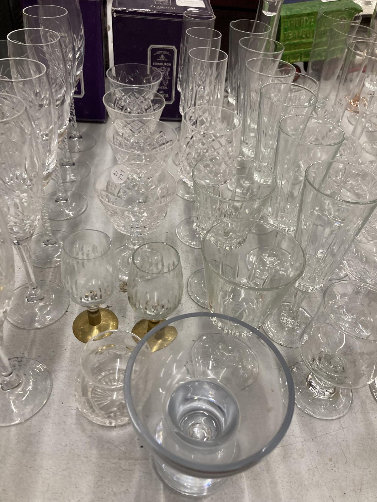 A VERY LARGE QUANTITY OF GLASSES, SOME CUT GLASS, TO INCLUDE CHAMPAGNE FLUTES, WINE, SHERRY, PORT, - Image 4 of 5