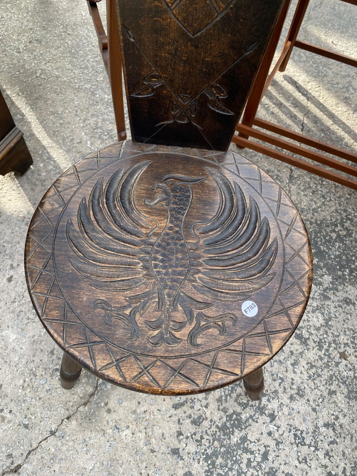 A CARVED BEECH SPINNING STOOL, CARVED BY HAND THE STUDIO OF ART AND ANTIQUITY, TORQUAY, DEVON - Image 3 of 3