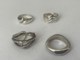 FOUR ASSORTED SILVER RINGS