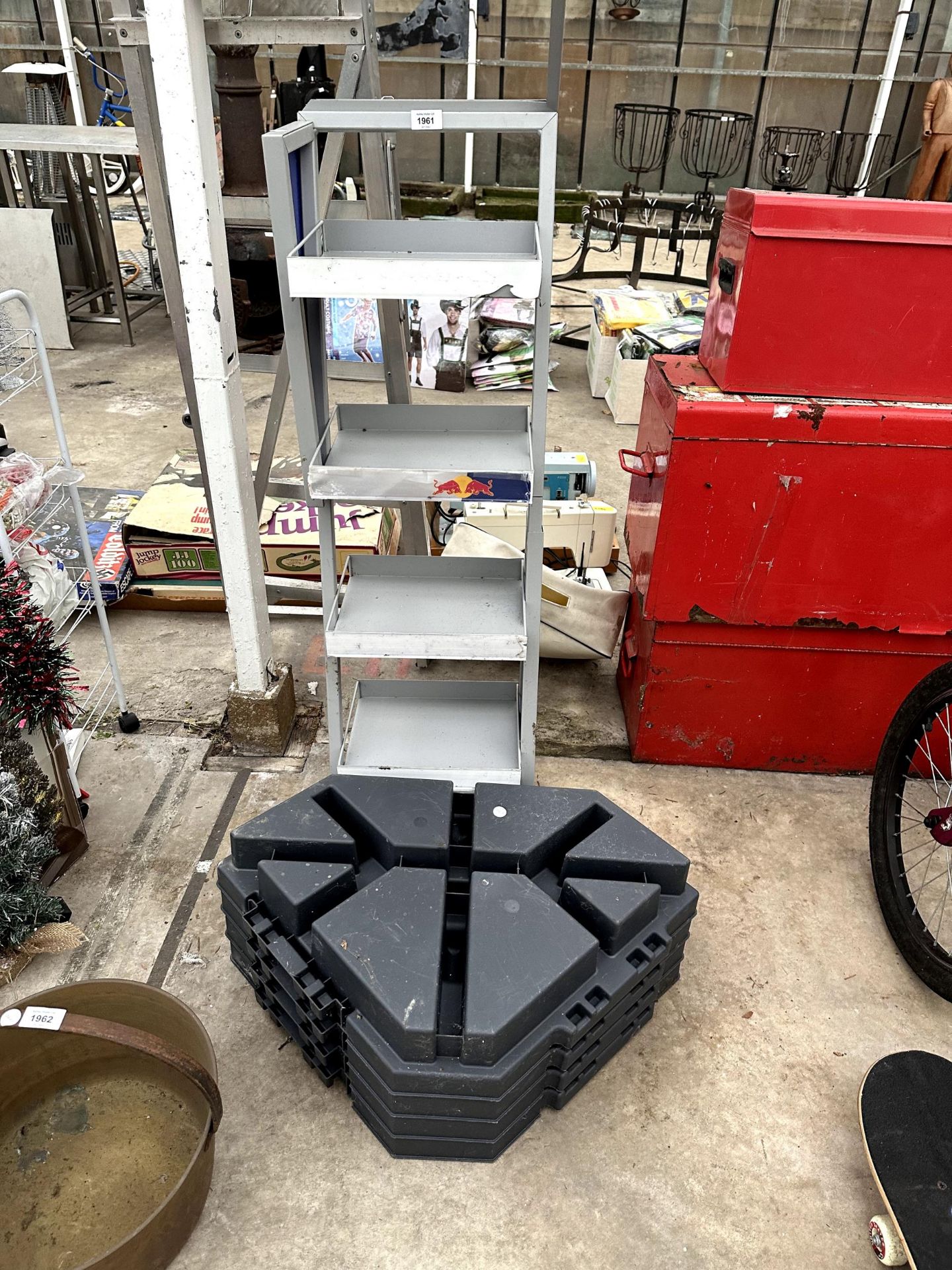 A SHOP DISPLAY STAND AND FOUR PLASTIC DISPLAY BLOCKS