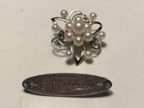 TWO SILVER BROOCHES