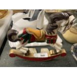 A VINTAGE STYLE CAST ROCKING HORSE DOOR STOP