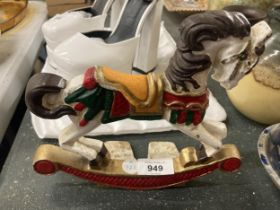 A VINTAGE STYLE CAST ROCKING HORSE DOOR STOP